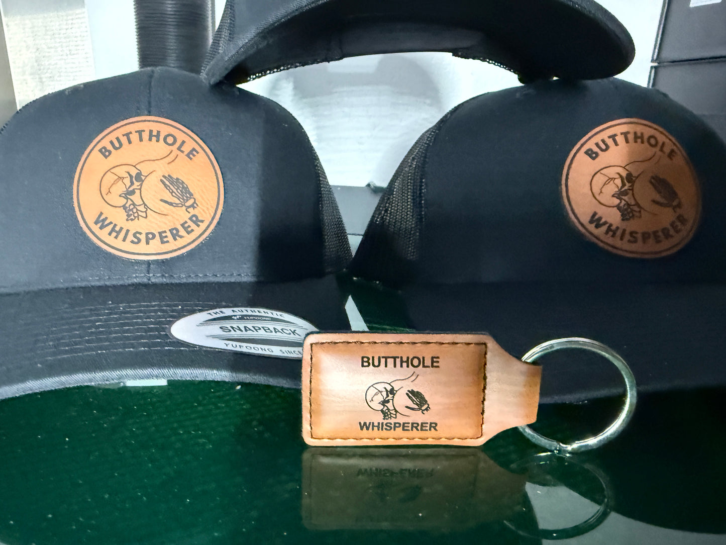 Booty Hole Whisperer Patched Hat | Black on Black Yupoong Classic Snapback | Funny Hat with Free Keychain!